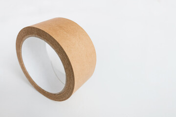 Roll of scotch tape on white.