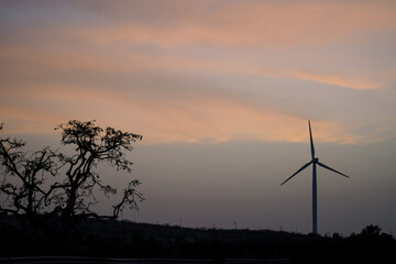 wind turbine at sunset