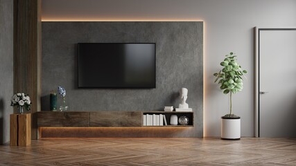 Mockup a TV wall mounted in a dark room with concrete wall.