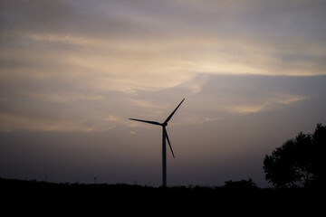 Fototapeta na wymiar wind turbine at sunset