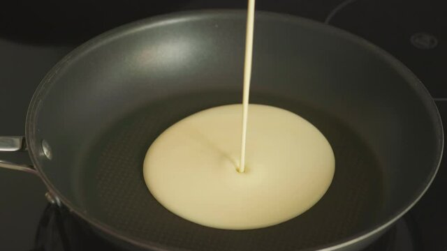 Cooking delicious pancakes in the kitchen in the morning. Tasty and healthy breakfast. Maslenitsa