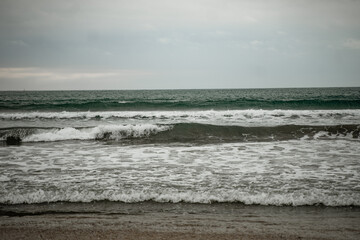 stormy sea, big waves in the evening