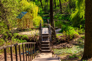 Small forged iron bridge in the Krasnokutsk park, Kharkiv region, Ukraine