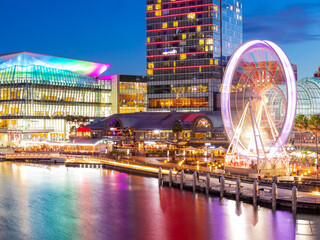Colourful night neon light views of Sydney Harbour Barangaroo Cockle Bay Wharf and Darling Harbour...