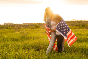 Crying little girl saying goodbye to her military mother outdoors