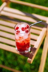 Refreshing summer alcoholic cocktail with ice and citrus fruits. Party, holiday concept.