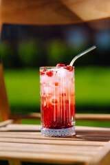 Refreshing summer alcoholic cocktail with ice and citrus fruits. Party, holiday concept.