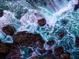 Color of the Pure seawater which splashes in rocks in Kanyakumari. Taken near the beach.