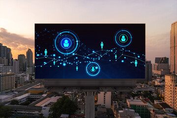 Glowing Social media icons on billboard over sunset panoramic city view of Bangkok. The concept of networking and establishing new connections between people and businesses in Southeast Asia