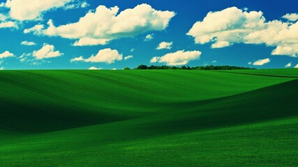 Beautiful spring landscape with blue sky, sun and clouds.