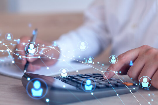 HR specialist researching and analyzing the data of salary on employment market to forecast ongoing expenses of the company using calculator. Hiring new talented officers. Social media hologram icons