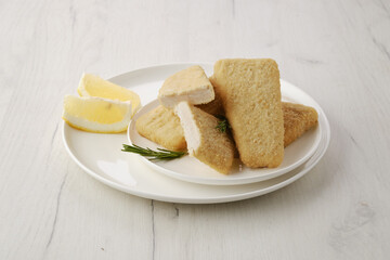 Frozen semifinished squid patty in breading