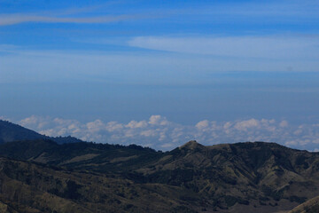 Plakat clouds over the mountains