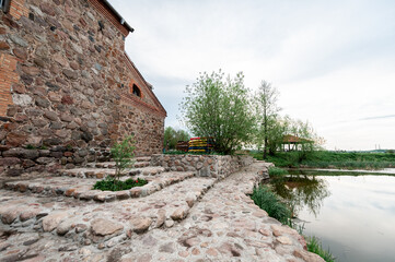 An old mill of the 19th century with a restoration in the village of Dvorishche