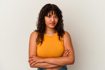 Young mixed race woman isolated on white background unhappy looking in camera with sarcastic expression.