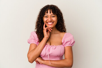 Fototapeta na wymiar Young mixed race woman isolated on white background smiling happy and confident, touching chin with hand.