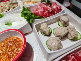 Chinese Hotpot Ma la. Mala Hot Pot or Szechuan Spicy Hot Pot consist of a spicy broth in which you put raw meat and vegetables to cook them before eating. 