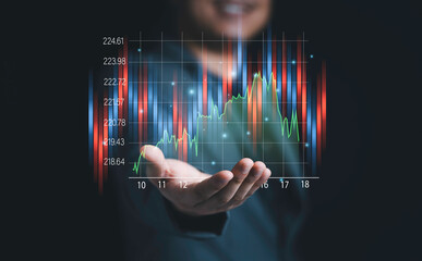 Stock market investment and business growth concept , Businessman holding stock market investment chart.
