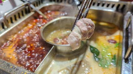 Chinese Hotpot Ma la. Mala Hot Pot or Szechuan Spicy Hot Pot consist of a spicy broth in which you...