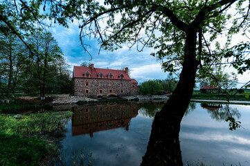 Old stone mill of the 19th century in the village of Dvorishche