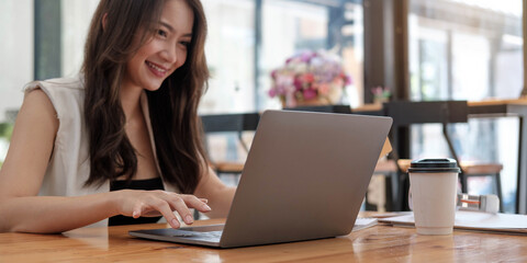 Fototapeta premium Business woman working in finance and accounting Analyze financial budget at home , Work from home concept