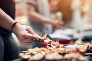 Preparing barbeque on a electrical modern grill outdoors.