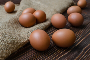 Raw organic brown eggs on the table