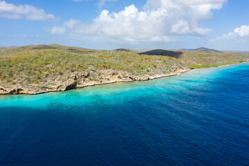 Aerial view above scenery of Curacao, Caribbean with ocean, coast and beach