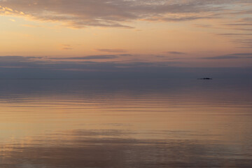 beautiful water with sky reflection sunset
