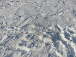 background: white snow with footprints