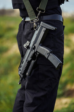 Close-up of a submachine gun of a police officer