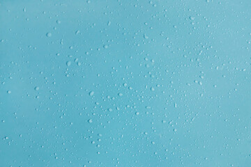 drops of water on a blue background.