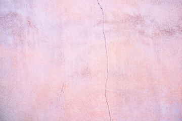 Texture of a painted Pink shabby concrete wall