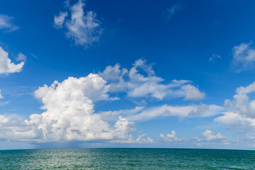 Naklejka na ściany i meble Beautiful white cloud and Blue Sky with sea at Mai Khao Beach Phuket,