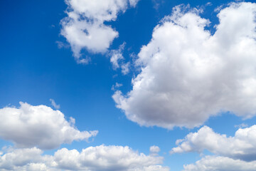Obraz na płótnie Canvas White clouds against blue sky