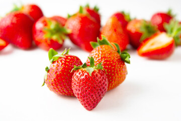 Fresh juicy strawberries fruits on white background. Fruit background.