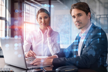 Businessman and businesswoman in formal wear working together looking for new employees to hire for international business consulting. HR, social media icons over modern panoramic office background