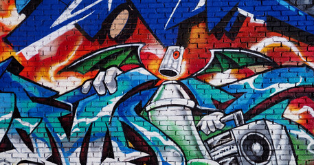 Naklejka premium Graffiti art painting old wall in the city.