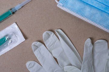 photo with medical objects, mask, syringe and gloves