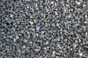 Gravel texture. Gray stones close-up. Building materials