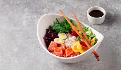 Poke bowl, salmon dish, rice, vegetables, quail eggs, avocado, lemon, healthy food, top view, horizontal, no people,