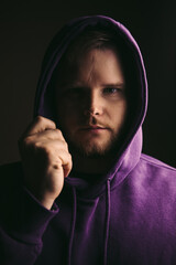 Fototapeta premium portrait of strong bearded man with one key light