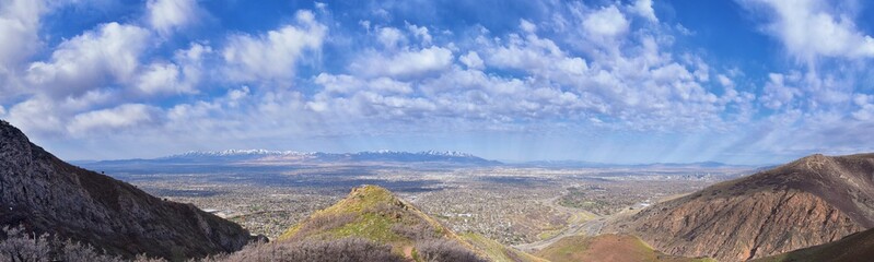 Fototapeta premium Rocky Mountains landscape views from Grandeur Peak hiking trail, Bonneville Shoreline Pipe Line Overlook Rattlesnake Gulch trail, Wasatch Front, by Salt Lake City, Utah. United States. USA