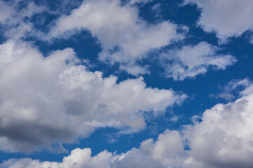 Cumulus clouds on the blue sky