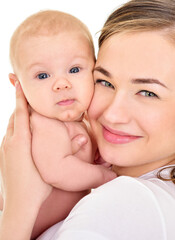 Mother and baby playing and smiling. Happy family.