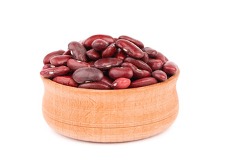 Red kidney beans in wooden bowl, isolated on white background. Rajma or Mexican Bean. Beans close up.