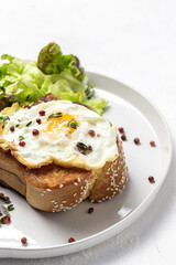 Homemade Fried Eggs with Brioche and Lettuce Salad