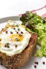 Homemade Fried Eggs with Brioche and Lettuce Salad
