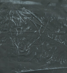 texture of black scratched polyethylene background