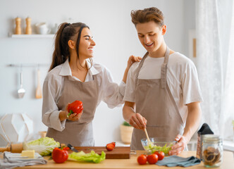 loving couple is preparing the proper meal